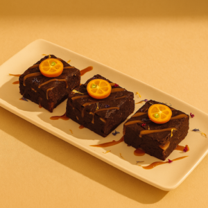 Flourless brownie de cacahuete con salsa de caramelo salado (Porción)